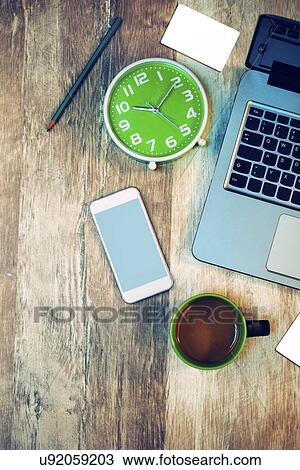 Stock Image - Modern business office workspace, top view.. Fotosearch