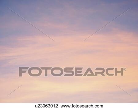 Stock Image - Moody clouds in sky. Fotosearch