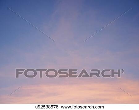 Stock Photograph - Moody clouds in sky. Fotosearch
