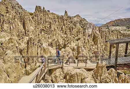 Mother and sons trekking along footpath, through rock formations, La Paz, Bolivia, South America View Large Photo Image Stock Image - Mother and sons trekking along footpath, through rock formations, La Paz, Bolivia, South America. Fotosearch