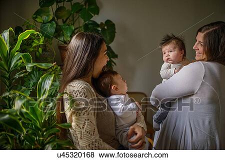 Mothers with their babies View Large Photo Image Stock Photo - Mothers with their babies. Fotosearch