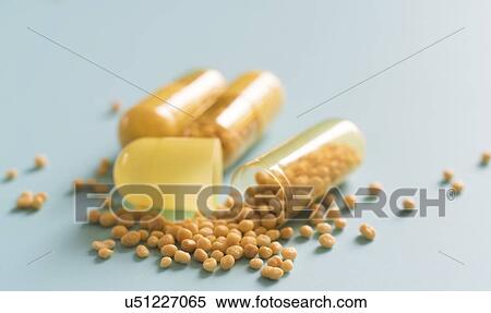 Stock Photography - Open dietary supplement capsule.. Fotosearch