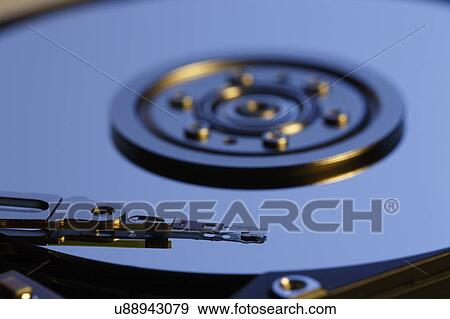 Stock Photo - Open hard disk drive (HDD).. Fotosearch