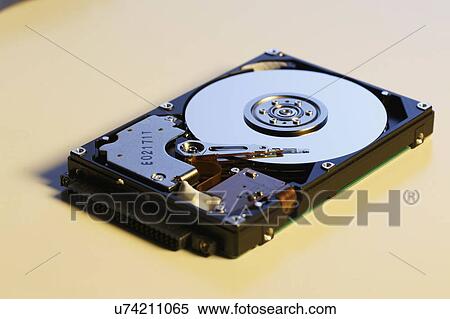 Open hard disk drive (HDD). View Large Photo Image Stock Photography - Open hard disk drive (HDD).. Fotosearch