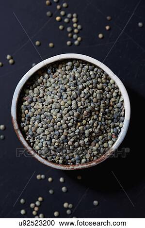 Overhead view of brown lentils in bowl View Large Photo Image Stock Image - Overhead view of brown lentils in bowl. Fotosearch