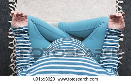 Overhead view of pregnant woman practicing yoga. View Large Photo Image Stock Image - Overhead view of pregnant woman practicing yoga.. Fotosearch