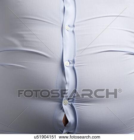 Overweight man wearing blue shirt with bulging buttons. View Large Photo Image Stock Image - Overweight man wearing blue shirt with bulging buttons.. Fotosearch