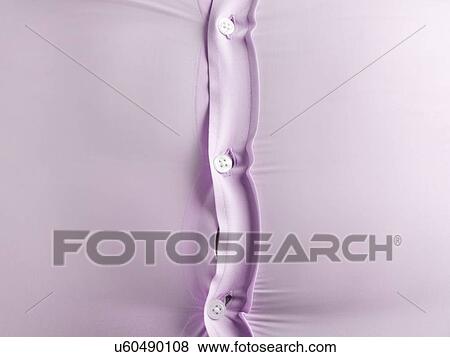 Stock Photo - Overweight man wearing pink shirt with bulging buttons.. Fotosearch