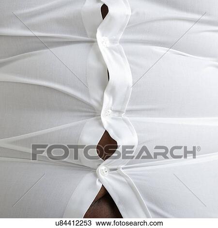 Overweight man wearing white shirt with bulging buttons. View Large Photo Image Stock Image - Overweight man wearing white shirt with bulging buttons.. Fotosearch