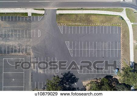Parking lot next to playing field View Large Photo Image Stock Photo - Parking lot next to playing field. Fotosearch