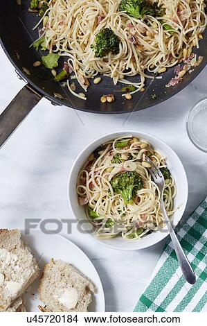 Picture - Pasta with broccoli and pine nuts. Fotosearch