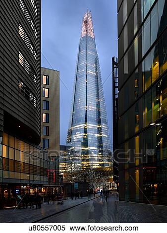 Pedestrian zone and view of The Shard at dusk, London, UK View Large Photo Image Stock Photography - Pedestrian zone and view of The Shard at dusk, London, UK. Fotosearch