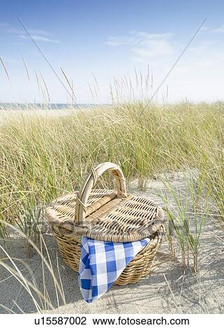 Picnic basket on beach View Large Photo Image Stock Image - Picnic basket on beach. Fotosearch