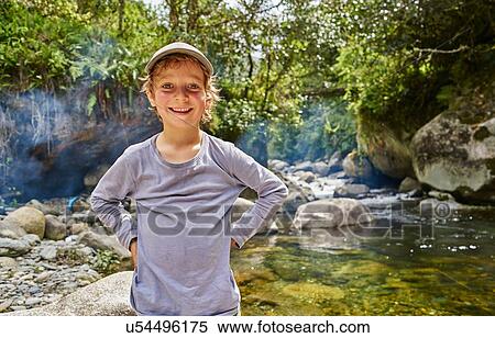 Portrait of boy beside water pool, Ventilla, La Paz, Bolivia, South America View Large Photo Image Stock Photography - Portrait of boy beside water pool, Ventilla, La Paz, Bolivia, South America. Fotosearch