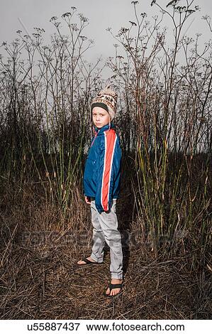 Portrait of boy in rural setting View Large Photo Image Stock Photo - Portrait of boy in rural setting. Fotosearch