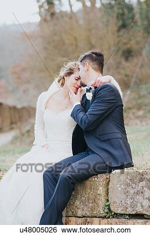 Portrait of bride and bridegroom on country lane View Large Photo Image Stock Photograph - Portrait of bride and bridegroom on country lane. Fotosearch