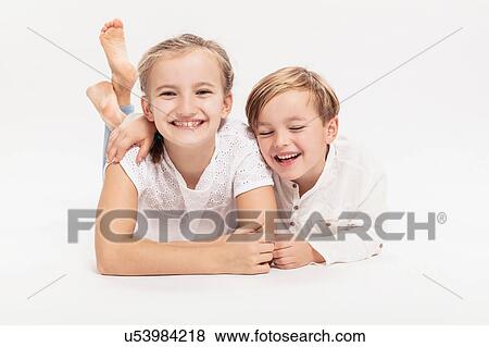 Stock Photo - Portrait of brother and sister. Fotosearch