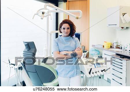 Portrait of female dentist in dentist office View Large Photo Image Stock Photography - Portrait of female dentist in dentist office. Fotosearch