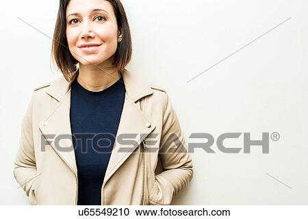 Stock Image - Portrait of female doctor. Fotosearch
