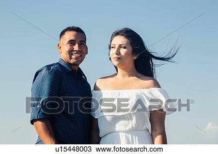 Portrait of hispanic couple outdoors View Large Photo Image Stock Image - Portrait of hispanic couple outdoors. Fotosearch