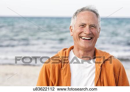 Stock Image - Portrait of senior man by seaside, Palma de Mallorca, Spain. Fotosearch