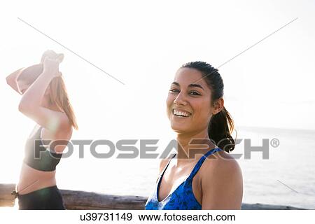 Portrait of two young women training on beach View Large Photo Image Stock Photo - Portrait of two young women training on beach. Fotosearch