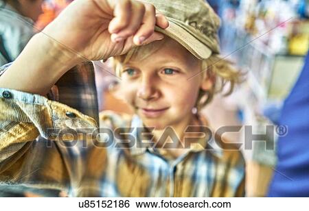 Stock Photograph - Portrait of young boy at festival, Sucre, Potosi, Bolivia, South America. Fotosearch