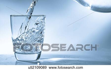 Stock Photo - Pouring water into glass.. Fotosearch