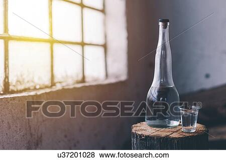 Rakia alcoholic drinking bottle with shot glass. View Large Photo Image Stock Photo - Rakia alcoholic drinking bottle with shot glass.. Fotosearch