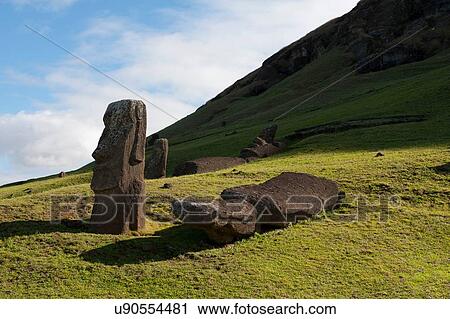 Stock Image - Rano Raraku moai statues, standing and fallen on Easter Island. Fotosearch