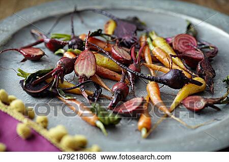 Roasted baby vegetables on tray View Large Photo Image Stock Photo - Roasted baby vegetables on tray. Fotosearch