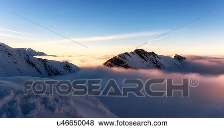 Scenic view of mountains in mist, Fagaras, Brasov, Romania, Europe View Large Photo Image Stock Photo - Scenic view of mountains in mist, Fagaras, Brasov, Romania, Europe. Fotosearch