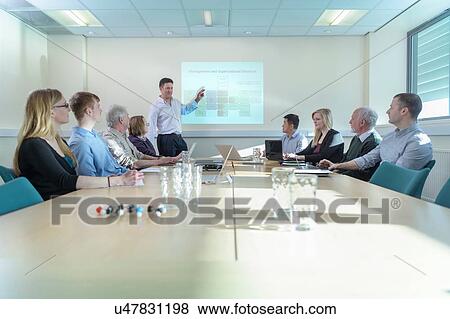 Scientists discussing pharmaceutical project in meeting room View Large Photo Image Stock Photo - Scientists discussing pharmaceutical project in meeting room. Fotosearch