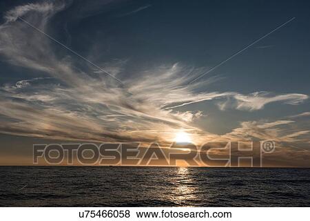 Stock Photo - Seascape and horizon at sunset, Porquerolles, Provence-Alpes-Cote d'Azur. Fotosearch