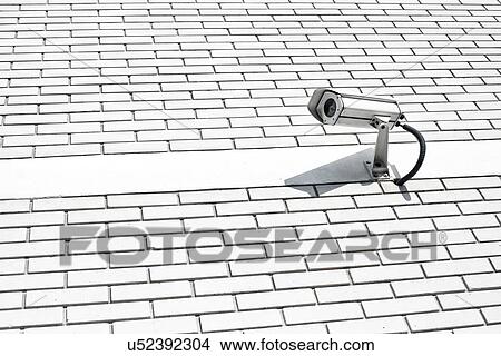 Security camera on wall. View Large Photo Image Picture - Security camera on wall.. Fotosearch