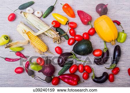 Selection of fresh vegetables on table, overhead view View Large Photo Image Stock Photo - Selection of fresh vegetables on table, overhead view. Fotosearch
