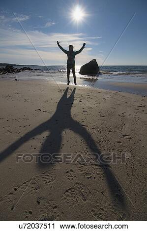 Silhouette of senior woman jumping on beach View Large Photo Image Stock Image - Silhouette of senior woman jumping on beach. Fotosearch
