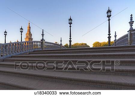 Stock Image - Spain, Andalusia, Seville, Stairway on Plaza de Espana at dawn. Fotosearch