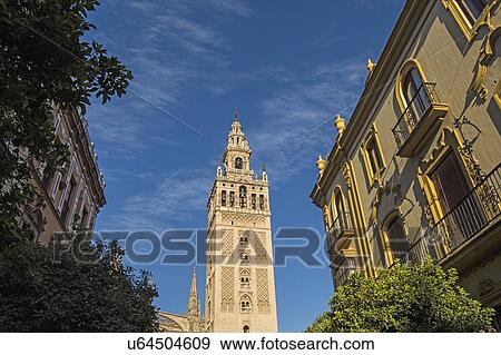 Stock Photo - Spain, Seville, Old town with Giralda tower. Fotosearch