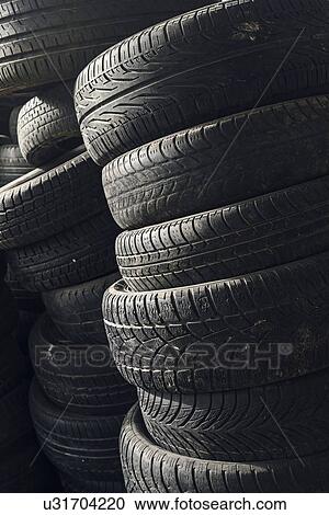 Stack of used car tyres. View Large Photo Image Stock Image - Stack of used car tyres.. Fotosearch