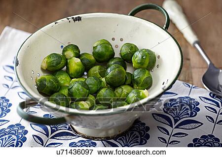 Stock Photo - Steamed sprouts in colander. Fotosearch