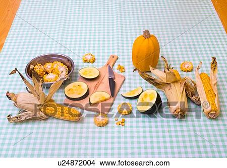 Picture - Still life of corn on the cob with two varieties of squash. Fotosearch