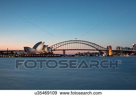 Sydney Harbor bridge and opera house, Sydney, New South Wales, Australia View Large Photo Image Stock Photo - Sydney Harbor bridge and opera house, Sydney, New South Wales, Australia. Fotosearch