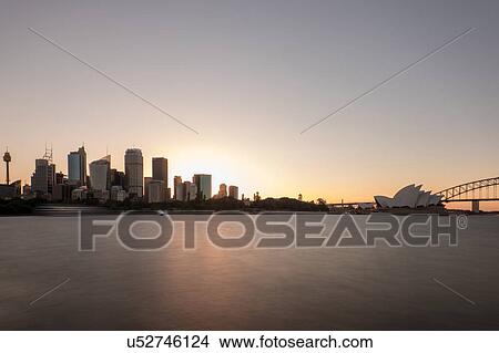 Picture - Sydney opera house and skyscrapers on skyline, Sydney, New South Wales, Australia. Fotosearch