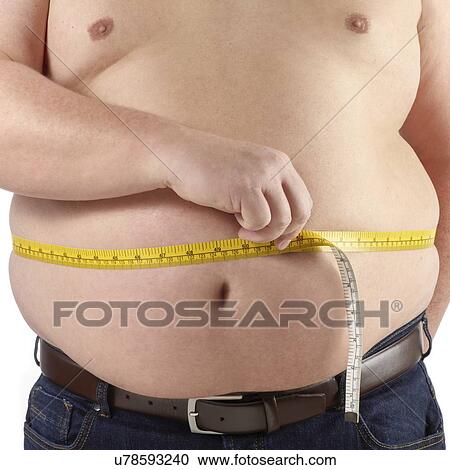 Topless overweight man using a tape measure to measure his waist. View Large Photo Image Stock Image - Topless overweight man using a tape measure to measure his waist.. Fotosearch
