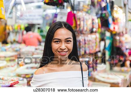 Tourist in bazaar, Bangkok, Thailand View Large Photo Image Stock Photo - Tourist in bazaar, Bangkok, Thailand. Fotosearch