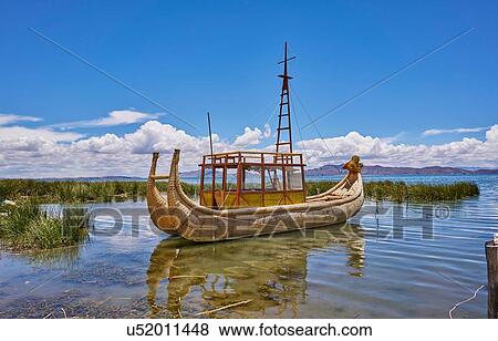 Stock Photo - Traditional grass boat, Lake Titicaca, Huarina, La Paz, Bolivia, South America. Fotosearch