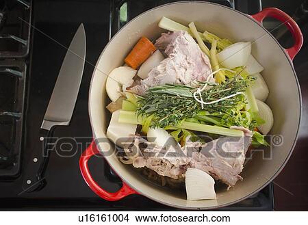 Turkey leftovers and vegetables in pot on stove View Large Photo Image Picture - Turkey leftovers and vegetables in pot on stove. Fotosearch