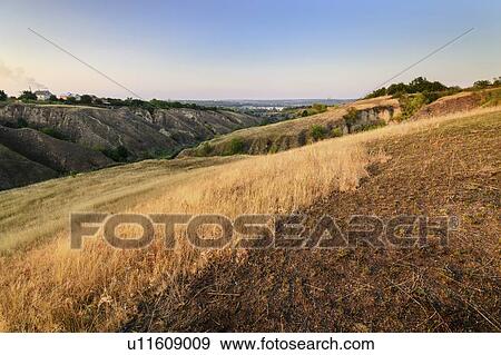 Ukraine, Dnepropetrovsk region, Novomoskovsk district, Landscape with ravine View Large Photo Image Stock Photo - Ukraine, Dnepropetrovsk region, Novomoskovsk district, Landscape with ravine. Fotosearch