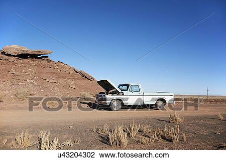 USA, Arizona, Broken pick-up truck on desert road View Large Photo Image Stock Image - USA, Arizona, Broken pick-up truck on desert road. Fotosearch